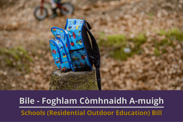 Picture: A child's colourful rucksack sitting on a tree stump in a forrest. Text reads 'Schools (Residential Outdoor Education) Bill'.