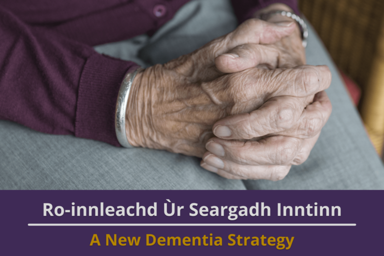 Picture: A close-up of an elderly lady's hands, clasped in her lap. Text reads 'A New Dementia Strategy'