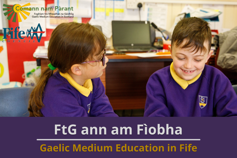 Picture: Two primary school pupils smiling in a classroom. Text reads 'Gaelic Medium Education in Fife'