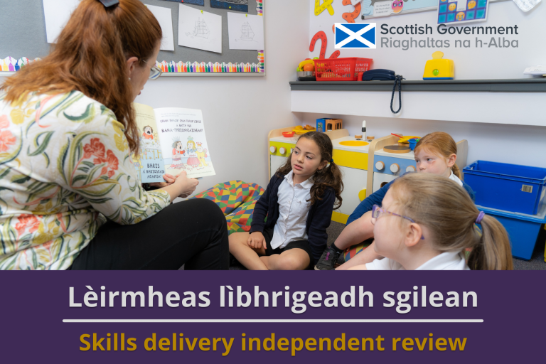 Picture: A teacher reading a Gaelic book to primary school pupils in a classroom. The Scottish Government logo appears in the top right of the image. Text reads 'Skills Delivery Independent Review'