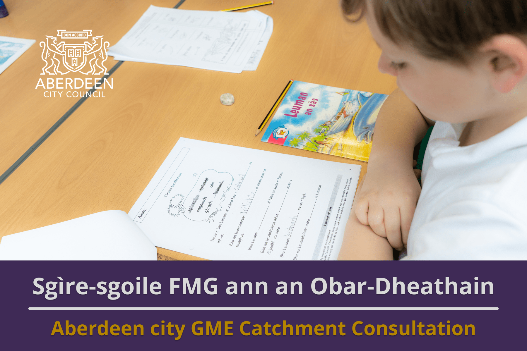 Picture: A boy in school uniform sitting at a desk in a primary school classroom doing his school work. The Aberdeen City Council Logo appears in the top left of the image. Text reads 'Aberdeen City GME Catchment Consultation'