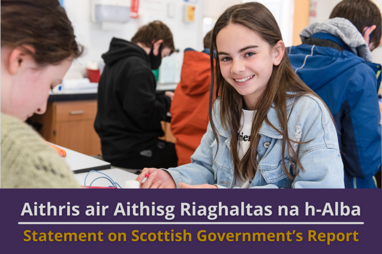 Picture: A girl in a high school class smiling. Text reads 'Statement on Scottish Government's Report'